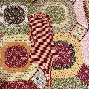 Orange striped turtleneck tank top bodysuit
